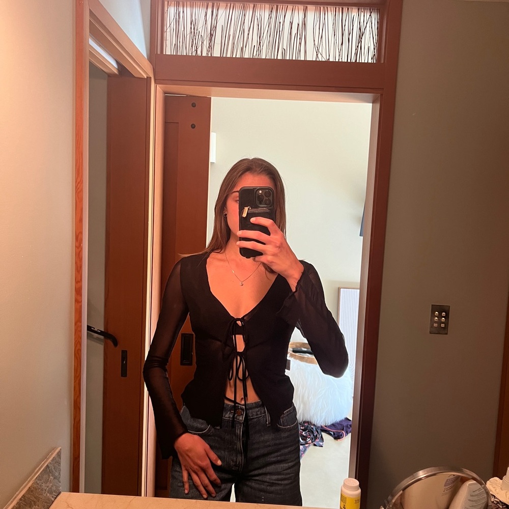 Mesh front tie long sleeve top.